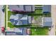 Aerial view of a home showcasing its backyard, roof, and proximity to neighboring houses at 1724 Prospect St, Indianapolis, IN 46203