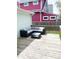 A cozy outdoor living space with deck, patio furniture set with glass table at 1724 Prospect St, Indianapolis, IN 46203