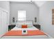 Inviting bedroom with a well-lit window and contemporary decor creating a soothing and comfortable space at 1724 Prospect St, Indianapolis, IN 46203