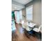 Cozy dining area with seating for four, complemented by natural light and sleek, modern fixtures at 1724 Prospect St, Indianapolis, IN 46203