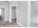 Bright hallway featuring neutral colors and doorways leading to different rooms, creating a seamless flow throughout the home at 1724 Prospect St, Indianapolis, IN 46203