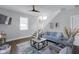 Inviting living room with a modern staircase, comfortable seating, and stylish decor at 1724 Prospect St, Indianapolis, IN 46203