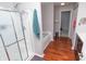 Bathroom showcasing separate shower and soaking tub with wood flooring at 1841 Sonesta Ln, Indianapolis, IN 46217