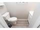 Small bathroom featuring a white toilet and vanity at 1841 Sonesta Ln, Indianapolis, IN 46217