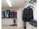 Walk-in closet featuring extensive shelving for storage at 1841 Sonesta Ln, Indianapolis, IN 46217
