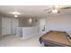 Upstairs game room features billiards table and offers entertainment possibilities at 1841 Sonesta Ln, Indianapolis, IN 46217