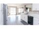 Open-concept kitchen and dining area with stainless steel appliances and bright natural light at 1841 Sonesta Ln, Indianapolis, IN 46217