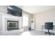 Bright living room features fireplace with mantle, television, and neutral paint at 1841 Sonesta Ln, Indianapolis, IN 46217