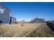 Spacious fenced backyard features a play set and ample green space for outdoor activities at 19149 Gillcrest Dr, Noblesville, IN 46062