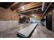 Unfinished basement transformed into a gym with exercise equipment and ample space at 19149 Gillcrest Dr, Noblesville, IN 46062