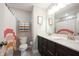 Bathroom with double vanity, mirror, toilet and artistic shower curtain at 19149 Gillcrest Dr, Noblesville, IN 46062
