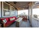 Cozy covered patio with comfortable sofa and stylish outdoor decor at 19149 Gillcrest Dr, Noblesville, IN 46062