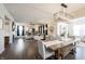 Open concept dining room with a view of the living room and fireplace, great for entertaining at 19149 Gillcrest Dr, Noblesville, IN 46062