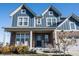 Beautiful two-story home with a welcoming front porch and well-maintained landscaping at 19149 Gillcrest Dr, Noblesville, IN 46062