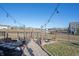 Backyard with a cozy firepit and comfortable Adirondack chairs at 19149 Gillcrest Dr, Noblesville, IN 46062
