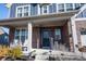 Charming front porch with rocking chairs, a brick facade, and stylish landscaping at 19149 Gillcrest Dr, Noblesville, IN 46062