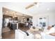 Open-concept design combining the living room and kitchen, creating a seamless living space at 19149 Gillcrest Dr, Noblesville, IN 46062