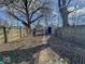 Backyard featuring a detached garage and wood fence at 1929 Wilcox St, Indianapolis, IN 46222