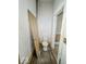 Small water closet with toilet, plumbing and peeling walls at 1929 Wilcox St, Indianapolis, IN 46222