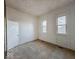 Bright bedroom with two windows allowing for natural light to illuminate the space at 1929 Wilcox St, Indianapolis, IN 46222
