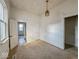 A simple bedroom featuring an adjoining bathroom for added convenience at 1929 Wilcox St, Indianapolis, IN 46222