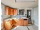 Close up of kitchen featuring upper and lower cabinets and stainless steel sink at 1929 Wilcox St, Indianapolis, IN 46222