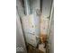 An older furnace and water heater sit in a corner utility space at 1929 Wilcox St, Indianapolis, IN 46222