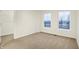 Bedroom featuring carpet flooring and two windows at 19511 Grassy Branch Rd, Westfield, IN 46074