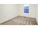 Bedroom with neutral walls and carpeted floors, illuminated by natural light from a window at 19511 Grassy Branch Rd, Westfield, IN 46074