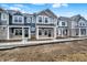Charming exteriors feature a blend of materials, complementing the well-maintained lawns at 19511 Grassy Branch Rd, Westfield, IN 46074