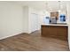 Modern kitchen features a large island and stainless steel appliances at 19511 Grassy Branch Rd, Westfield, IN 46074