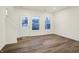 Light-filled room featuring hardwood floors, perfect for relaxing or entertaining at 19511 Grassy Branch Rd, Westfield, IN 46074