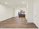 Spacious open layout with hard wood floors connects the living area to the kitchen at 19511 Grassy Branch Rd, Westfield, IN 46074