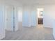 A carpeted bedroom with door frames leading to other rooms and the main bathroom at 2150 Aviary Ln, Danville, IN 46122