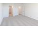 Bedroom with neutral carpet and two doorways at 2150 Aviary Ln, Danville, IN 46122