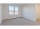 Bright, carpeted bedroom with a large window for natural light at 2150 Aviary Ln, Danville, IN 46122