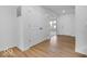 Entryway featuring luxury vinyl flooring, closet and view into the living room at 2150 Aviary Ln, Danville, IN 46122