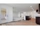 Beautiful kitchen featuring an island with a stainless steel sink and wooden floors at 2150 Aviary Ln, Danville, IN 46122