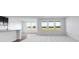 Bright living space with large windows offering views of green space, and new plush carpet at 2150 Aviary Ln, Danville, IN 46122