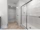Bathroom shower with glass door at 2150 Aviary Ln, Danville, IN 46122