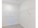 An empty walk-in closet with bright white walls and wire shelving at 2150 Aviary Ln, Danville, IN 46122