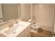 Bathroom featuring quartz countertop, vanity and shower-tub combination at 2349 S Copperstone Dr, New Palestine, IN 46163