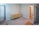 Bedroom with grey walls, a dresser and a doorway at 2349 S Copperstone Dr, New Palestine, IN 46163