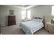 Cozy bedroom with comfortable bed, carpet floors, and serene natural light at 2349 S Copperstone Dr, New Palestine, IN 46163