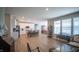 Open-concept living area with hardwood floors leading to the kitchen at 2349 S Copperstone Dr, New Palestine, IN 46163
