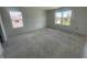 Bedroom featuring two bright windows and neutral walls at 24409 Stout St, Sheridan, IN 46069
