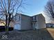 Exterior side view featuring neutral siding and well-manicured lawn at 2549 Black Antler Ct, Indianapolis, IN 46217