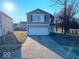 Charming two-story home featuring a two-car garage and a well-maintained front yard in a suburban neighborhood at 2549 Black Antler Ct, Indianapolis, IN 46217