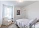 Cozy bedroom featuring a comfortable chair, soft carpet, and a queen size bed at 275 Hunters Ridge Dr, Danville, IN 46122