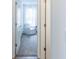 View into a light bedroom with a white chair and sheer white curtains at 275 Hunters Ridge Dr, Danville, IN 46122
